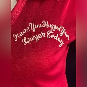 Polo shirt, custom made. “Have you hugged your lawyer today” red